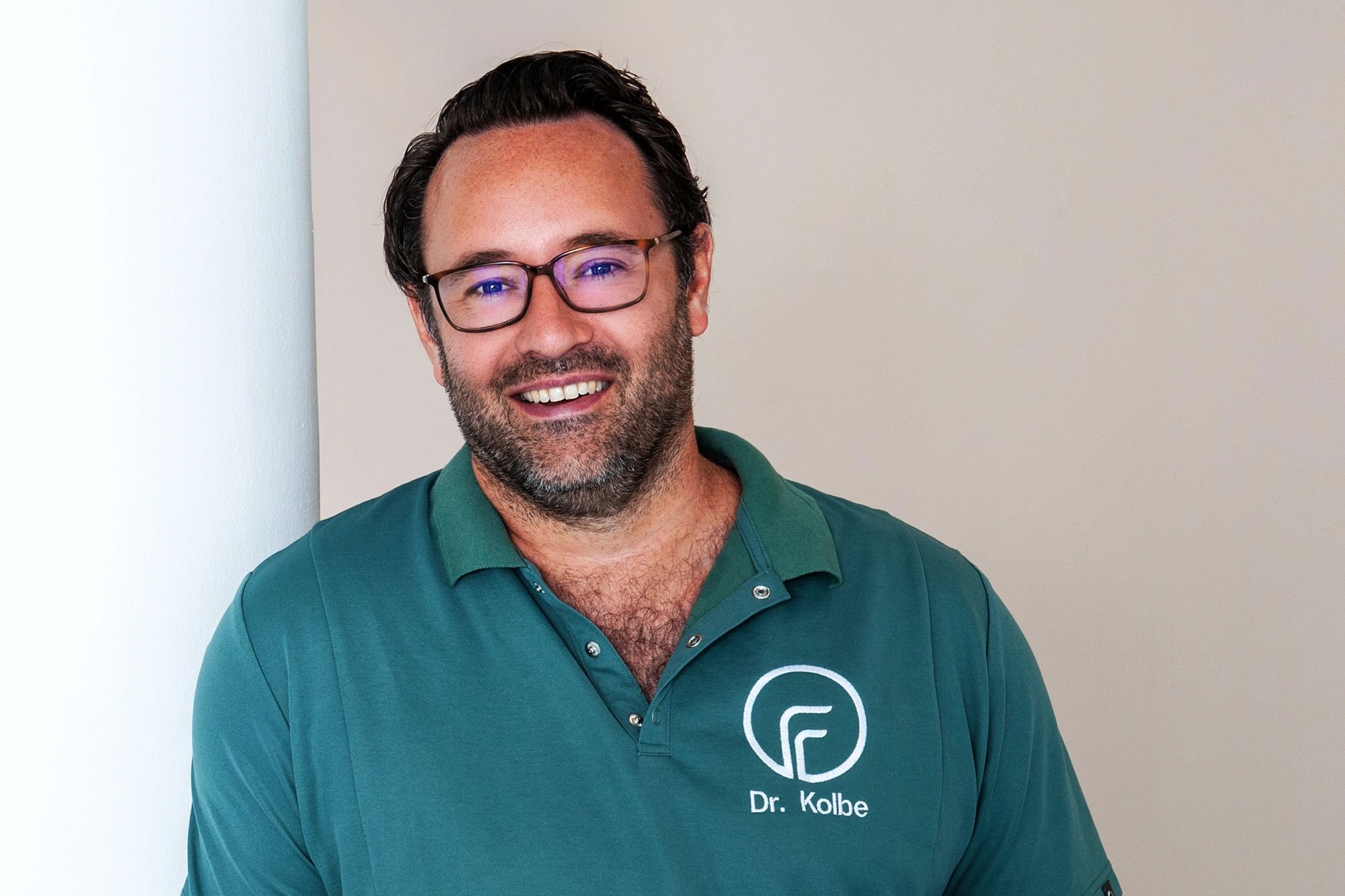 Portraitaufnahme von Dr. Rainer Kolbe